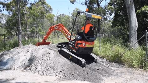 mini digger slope|mini excavator climbing slope.